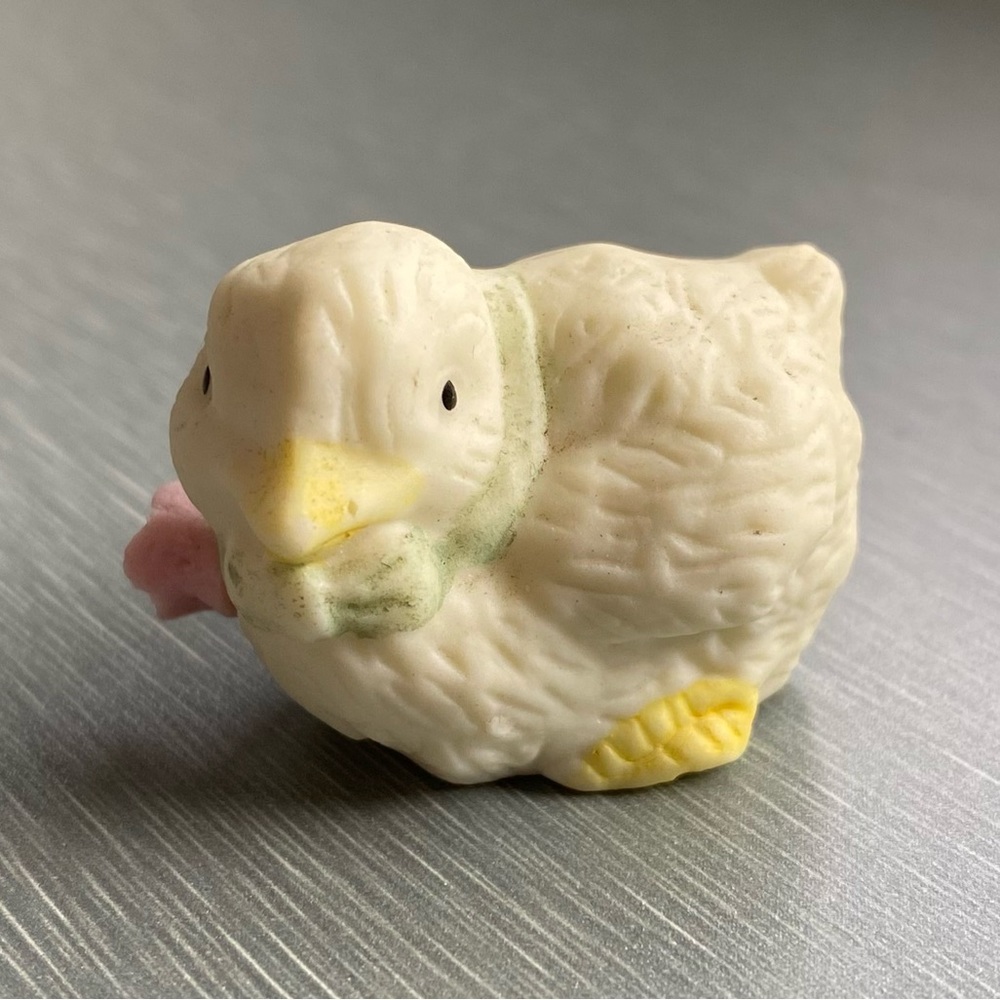 Vintage Porcelain Chick with a Pink Flower